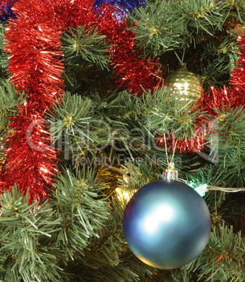 many of toys on green christmas fir