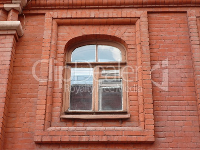 red brick wall with window