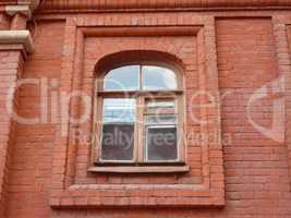 red brick wall with window