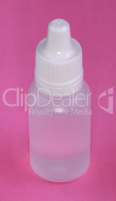 White Plastic Vial on Pink Background