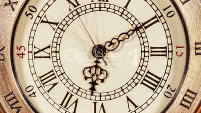 Antique clock dial close-up. Vintage pocket watch.