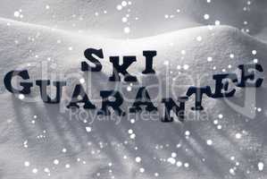 Blue Word Ski Guarantee On Snow, Snowflakes