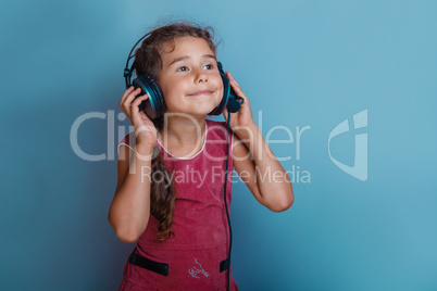 Girl  European appearance  decade listening to music with headp