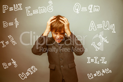 Teen boy scientist fails holding his head formula physics scienc