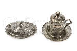 metal cup and sugar bowl