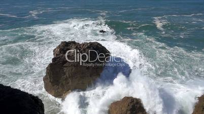 Slow Motion Ocean Waves Breaking on Rocks, storm weather