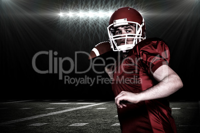 Composite image of american football player throwing a ball