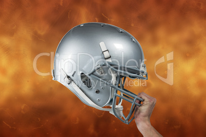 Composite image of close-up of american football player handing