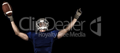 Composite image of american football player gesturing victory