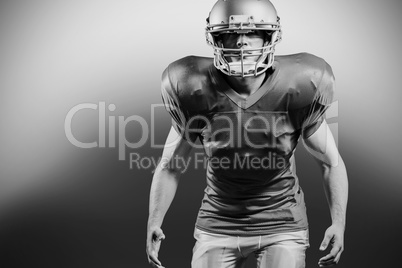 American football player standing in position