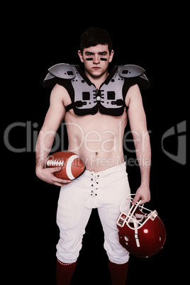Composite image of american football player holding a ball and h