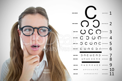 Composite image of female geeky hipster looking confused