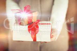 Woman with nail varnish holding gifts