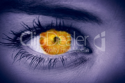 Composite image of orange eye on female face