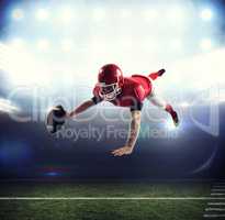 Composite image of american football player reaching football