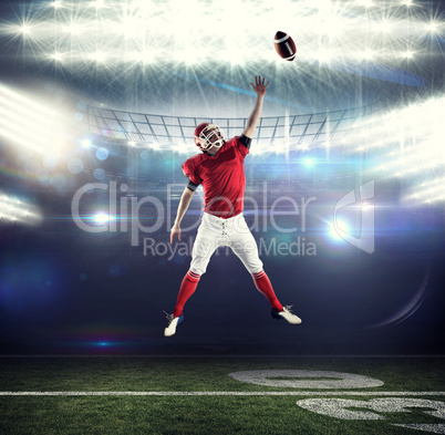 Composite image of american football player trying to catch foot