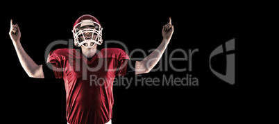 Composite image of american football player triumphing