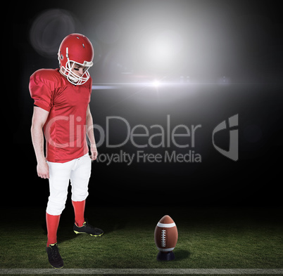 Composite image of unsmiling american football player looking do