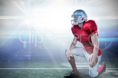 Composite image of american football player looking away while k