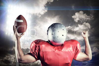 Composite image of rear view of american football player cheerin