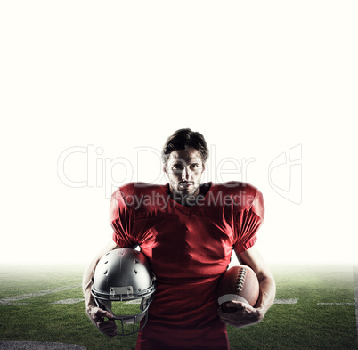 Composite image of confident american football player in red jer