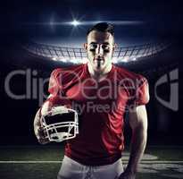 Composite image of american football player looking at camera