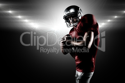 Composite image of serious american football player in red jerse