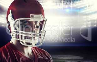 Composite image of american football player looking at camera