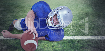 Composite image of american football player struggling to catch
