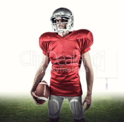 Composite image of american football player in red jersey lookin