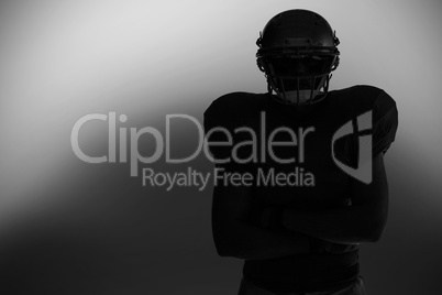 Silhouette American football player standing