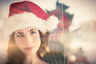 Portrait of a festive brunette thinking