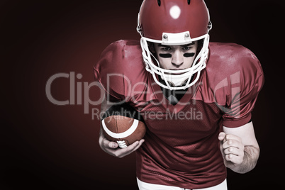 Composite image of american football player running with the ball