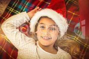 Festive little girl smiling on blanket