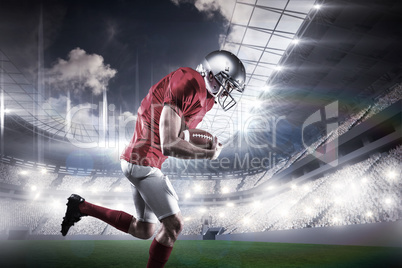 Composite image of american football player holding ball while r