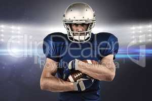 Composite image of portrait of confident sportsman holding ball