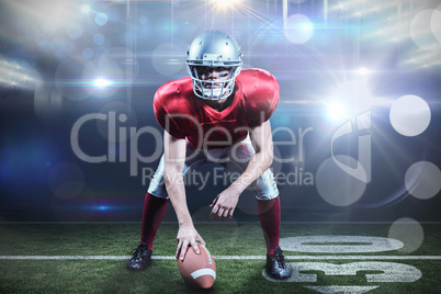 Composite image of american football player holding helmet