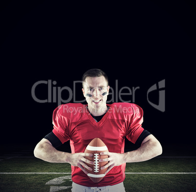 Composite image of american football player about to throw the b