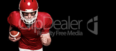 Composite image of american football player running with the bal