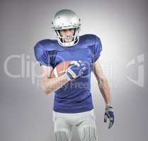 Composite image of portrait of confident american football playe