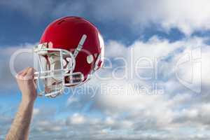 Composite image of a helmet of an american football player