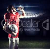 Composite image of thirsty american football player in red jerse