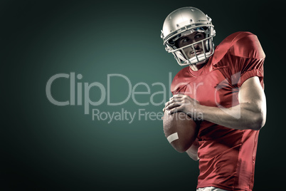 Composite image of american football player in red jersey throwing the ball