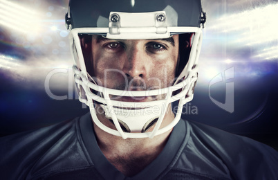 Composite image of american football player looking at camera