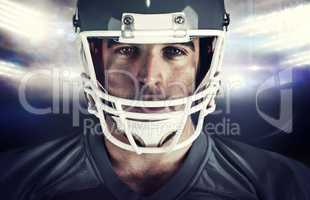 Composite image of american football player looking at camera