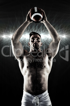 Composite image of shirtless american football player with ball