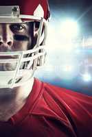 Composite image of american football player looking at camera