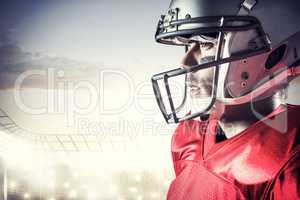 Composite image of side view of sportsman wearing helmet