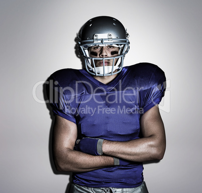 Composite image of portrait of determined american football play