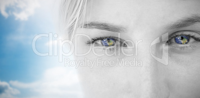 Composite image of pretty blonde applying contact lens